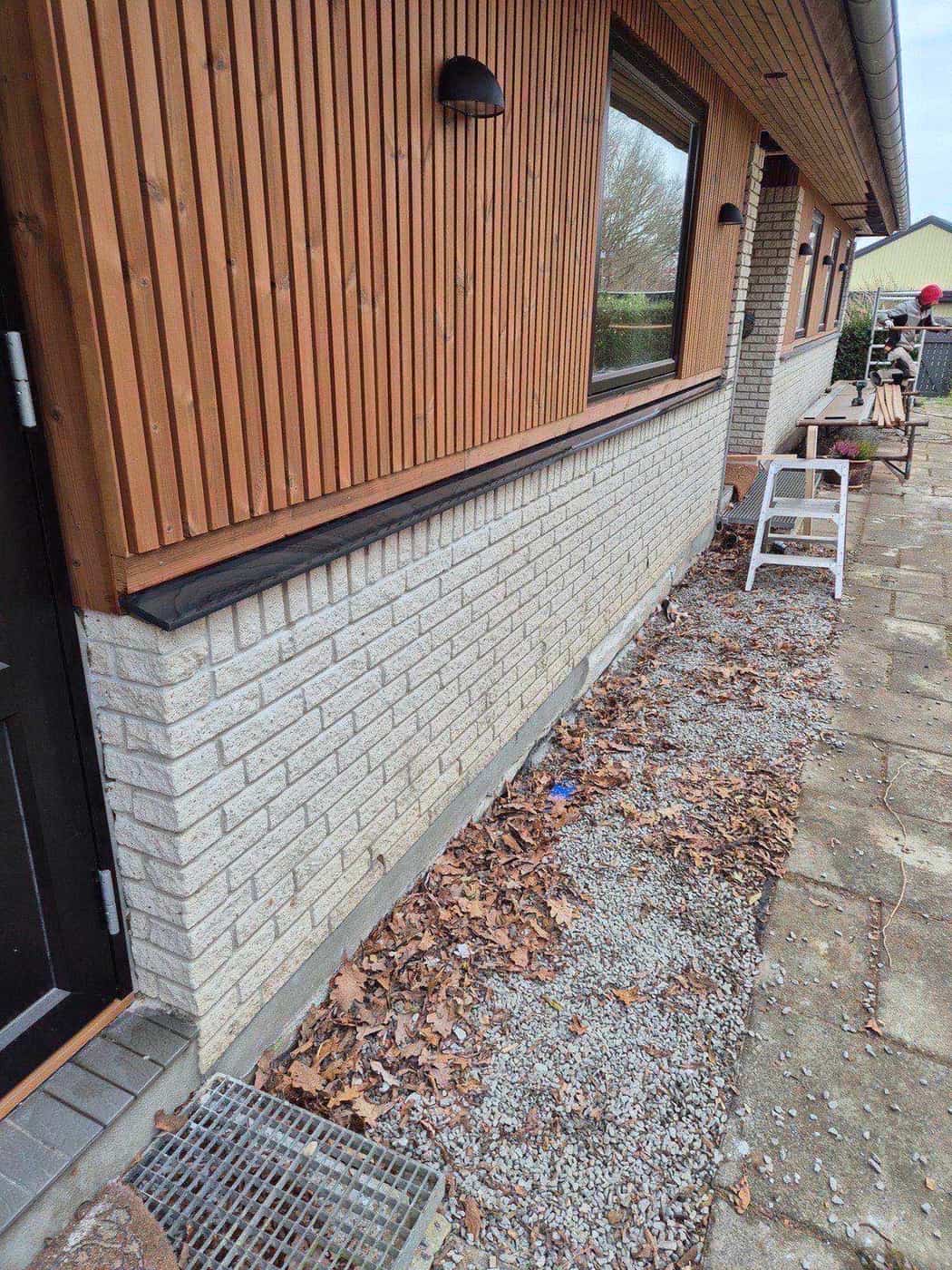 Murer i gang med facaderenovering i Nordsjælland